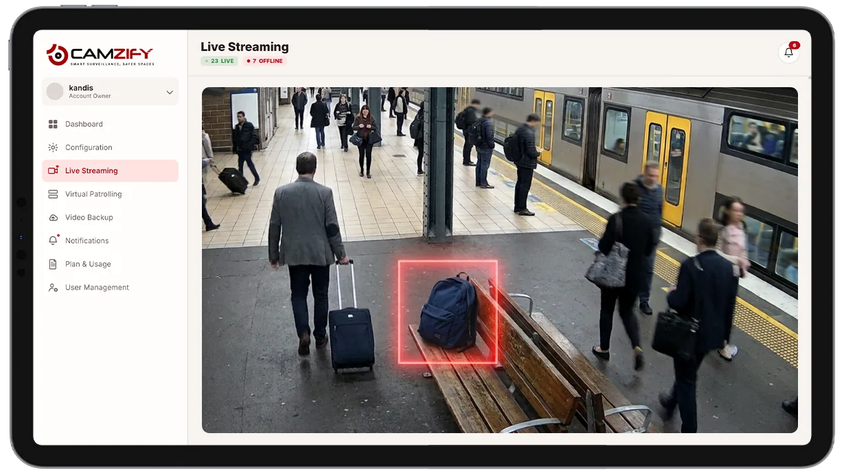 Camera view of a lobby with an unattended bag highlighted by a detection bounding box