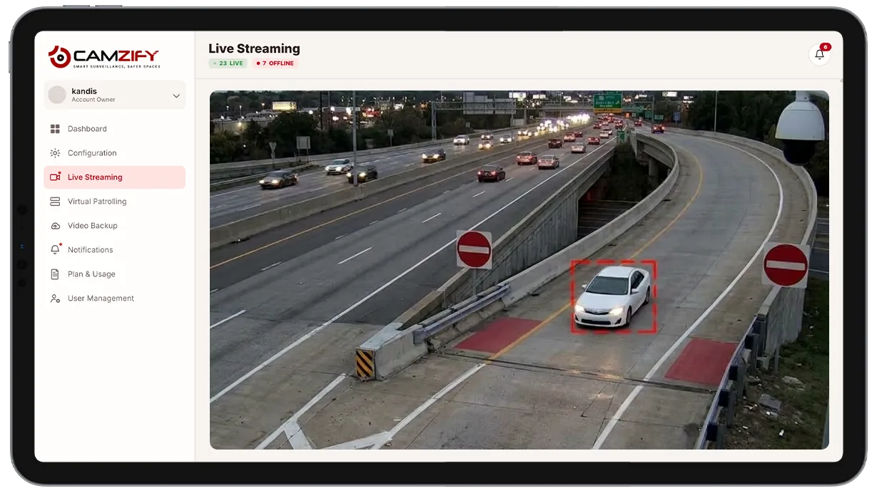 Camera view of a one-way ramp with a wrong-way vehicle highlighted by a directional detection overlay