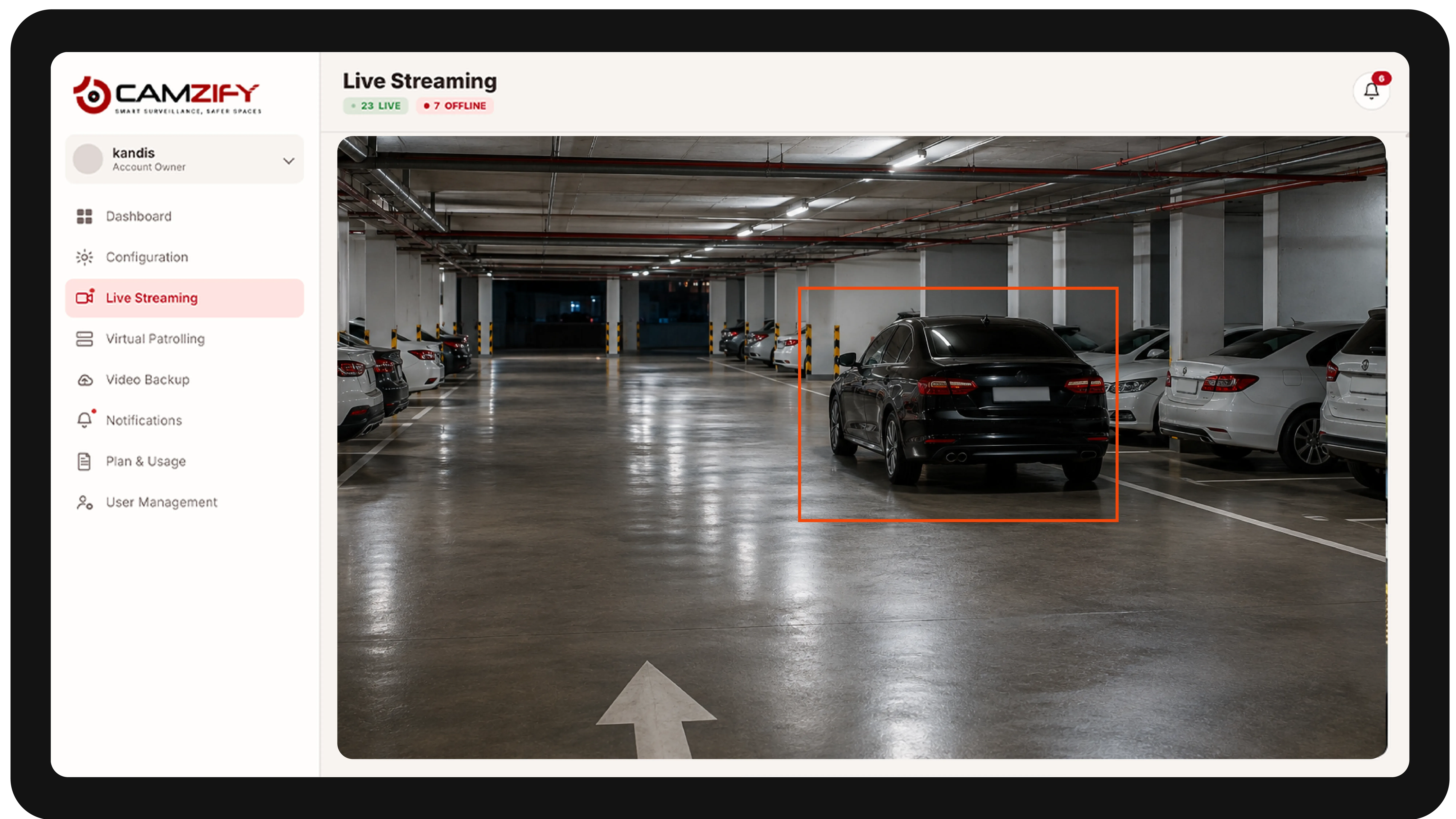 Live streaming from a property camera with people and vehicles outlined as they are tracked